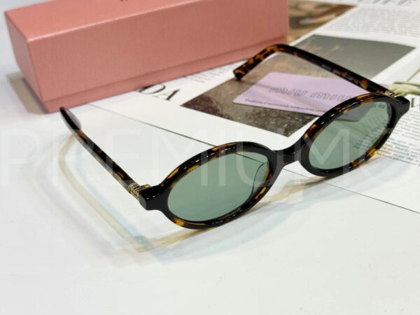 Miu Miu очки PR527075