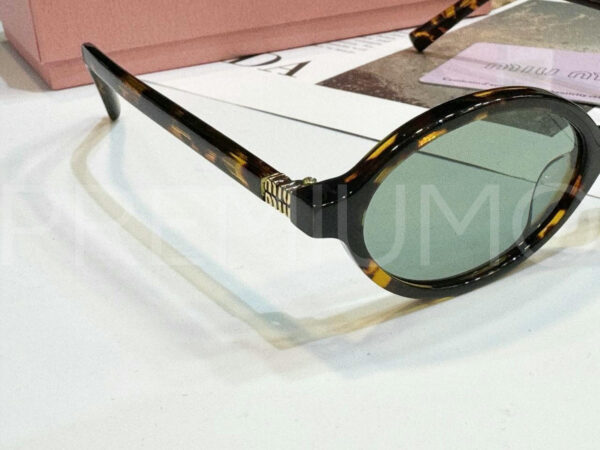Miu Miu очки PR527075 2