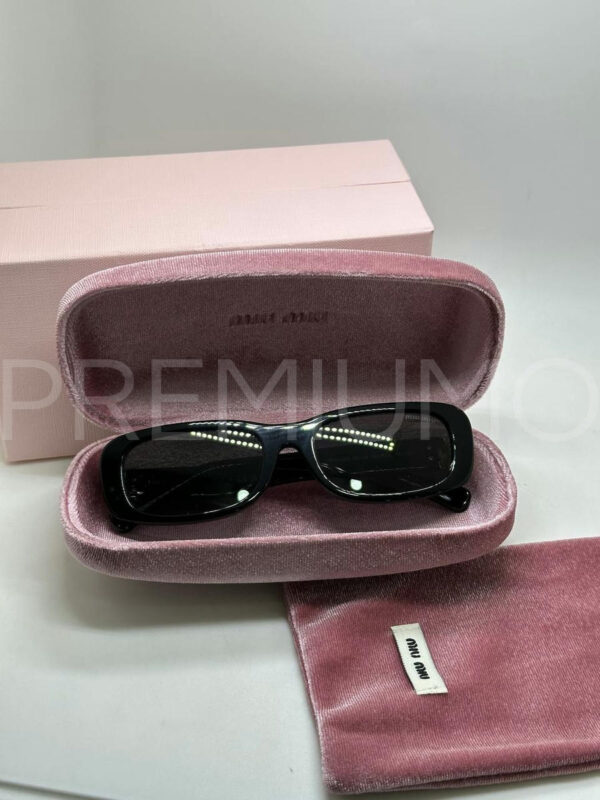 Miu Miu очки PR906583 3