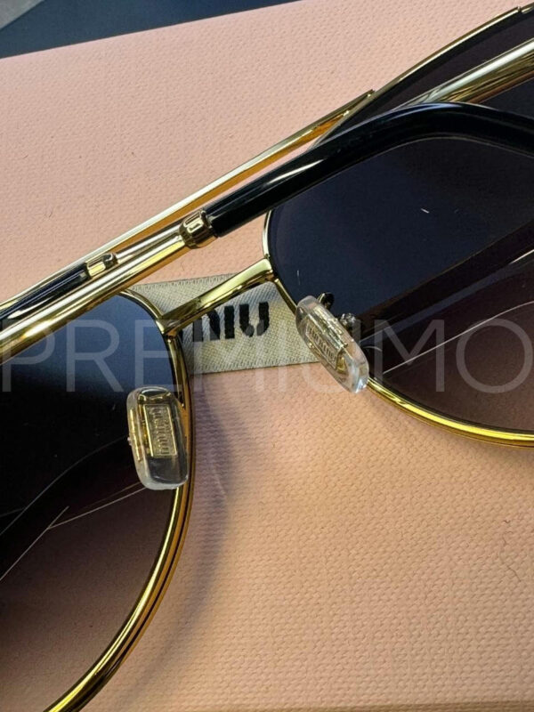 Miu Miu очки PR212406 4