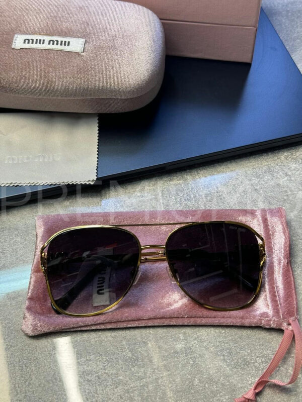 Miu Miu очки PR212406