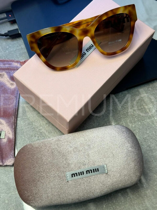 Miu Miu очки PR673811 2