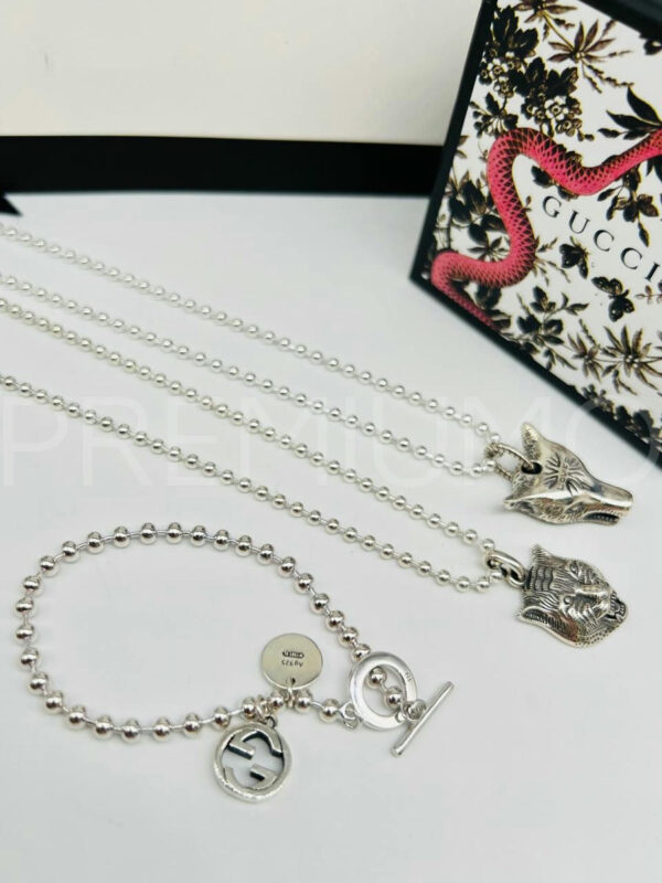 Gucci кулон справа PR676528 2